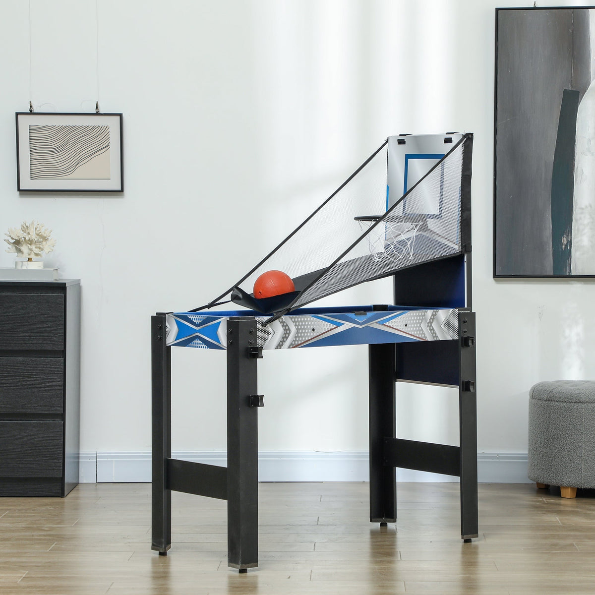 The multi games table set up for basketball in a room