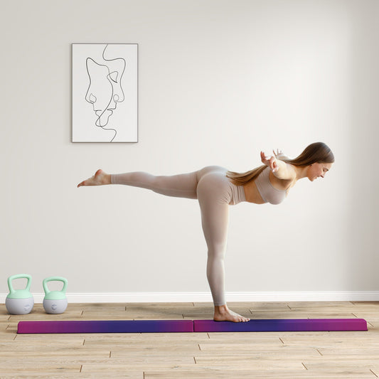 The balance beam placed on a wooden floor with a person balancing on it in a bright room
