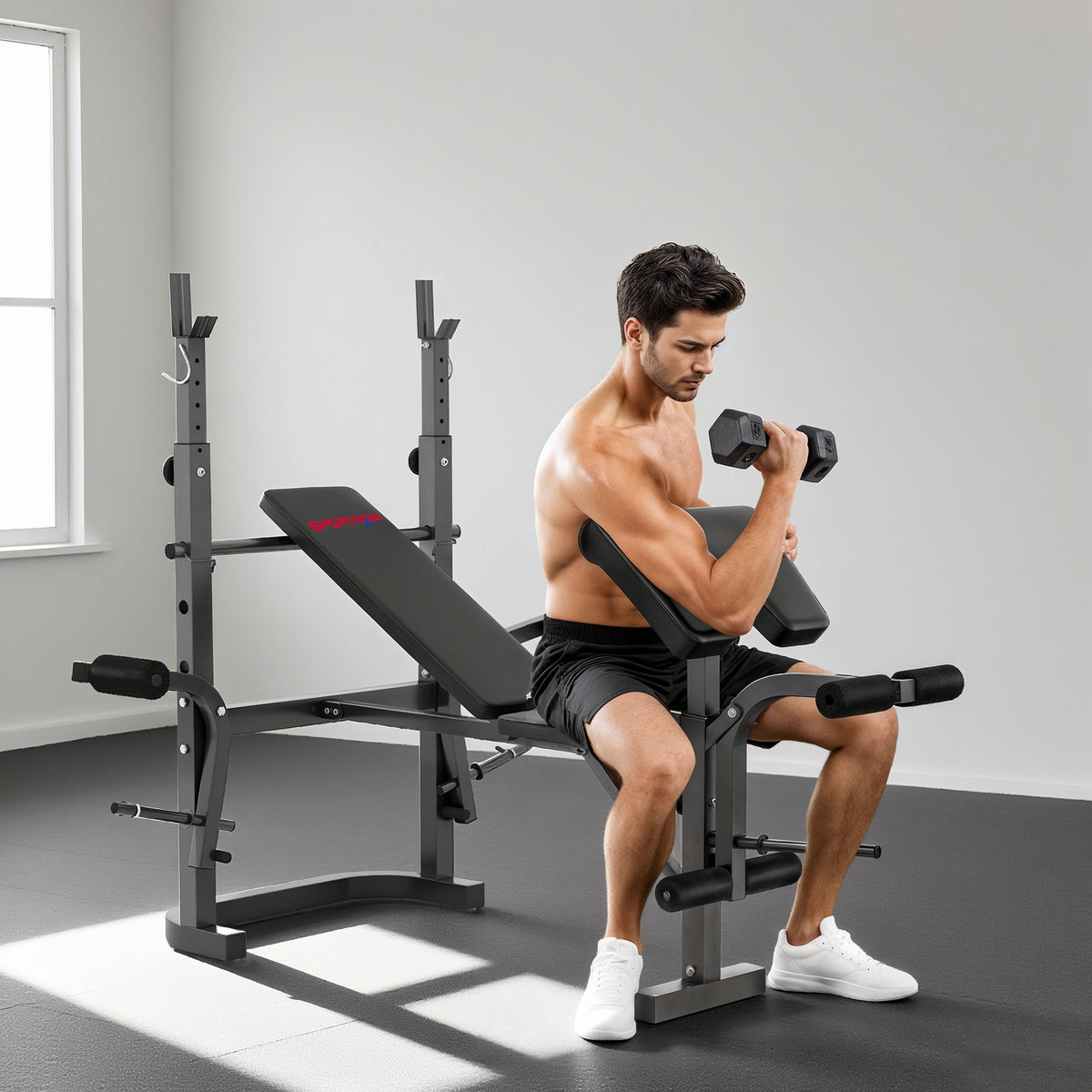 A man sitting on the weight bench performing a bicep curl with a dumbbell
