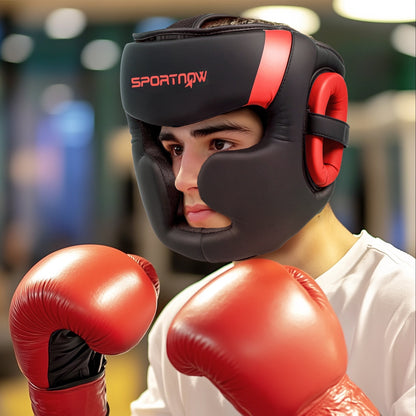 the boxing headguard worn by a person wearing red boxing gloves in a gym setting
