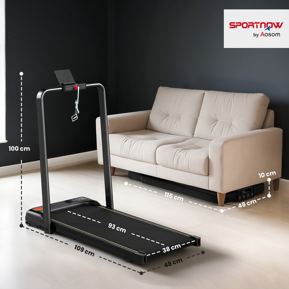 Compact black folding treadmill shown with dimensions marked, placed in a living room next to a sofa