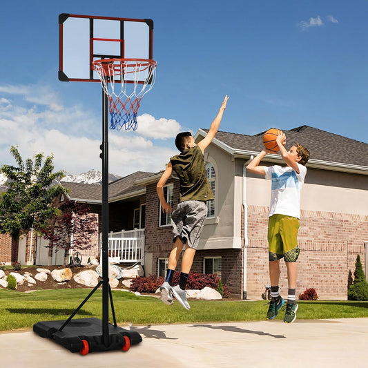 Two boys playing basketball with the hoop and stand in a garden