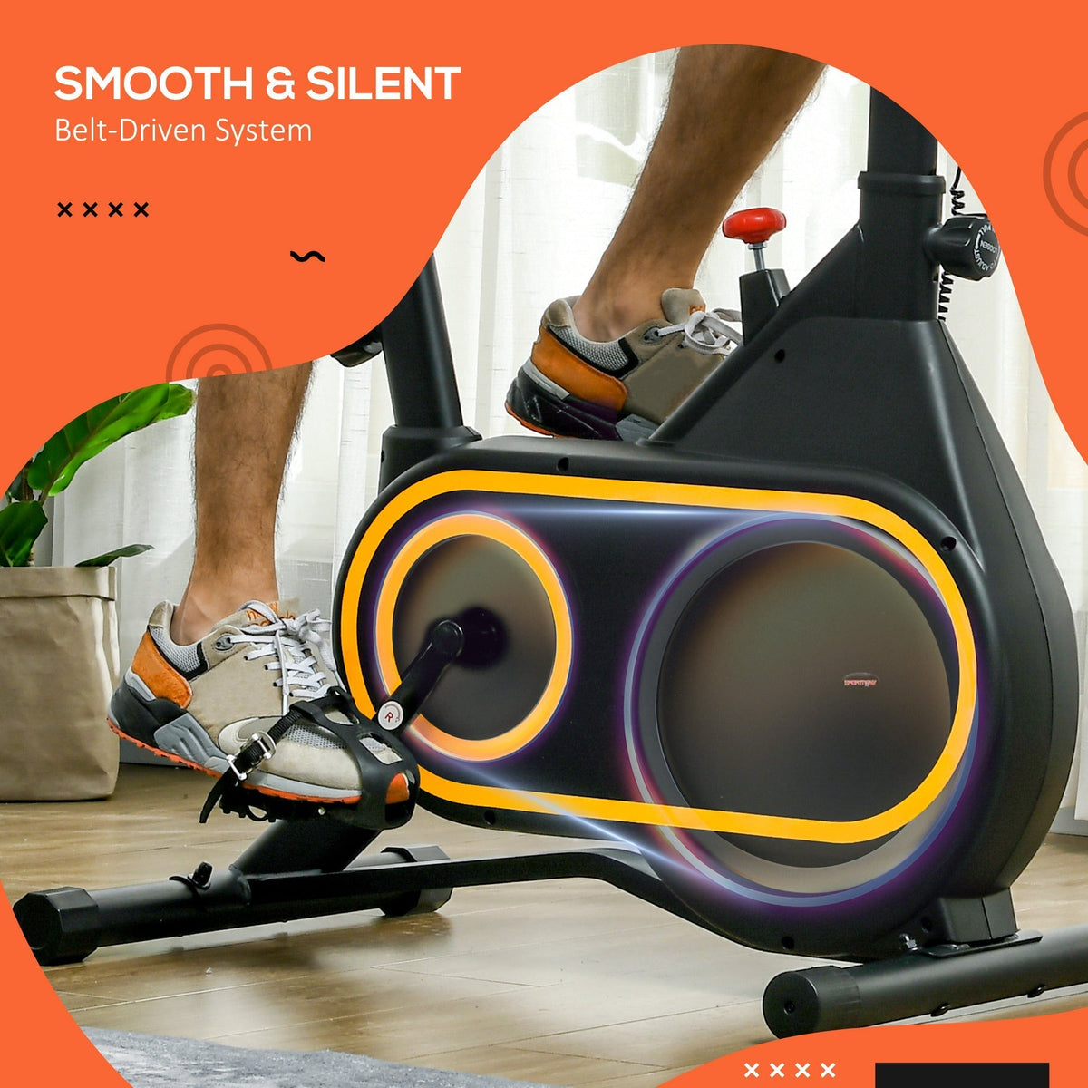 Close up of the pedals and belt driven system on the exercise bike
