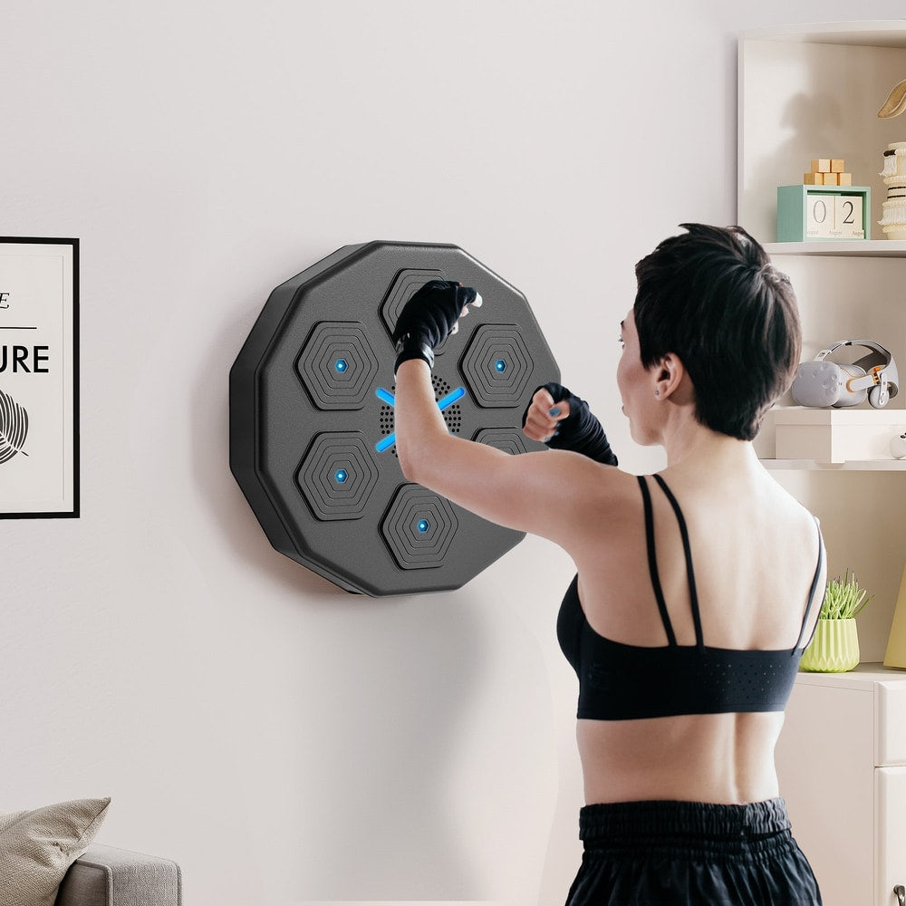 The boxing bag mounted on a wall with a person wearing gloves training in a living room setting