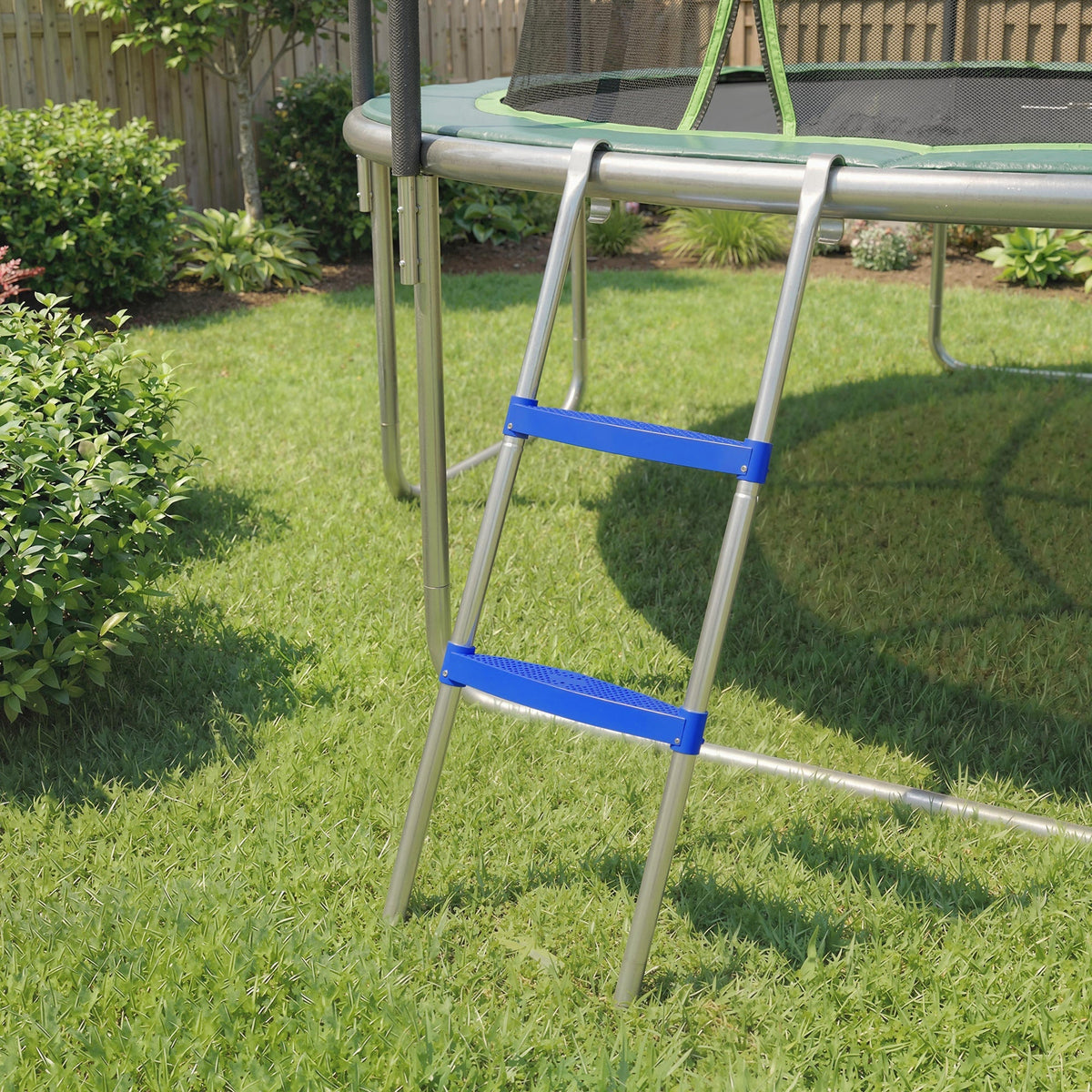 The trampoline ladder hooked onto the side of a garden trampoline on a green lawn
