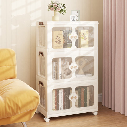 The white three-tier storage cabinet filled with books and decorative items, placed next to a yellow armchair