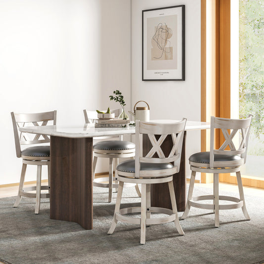 The bar stools arranged around a dining table in a bright modern living room setting