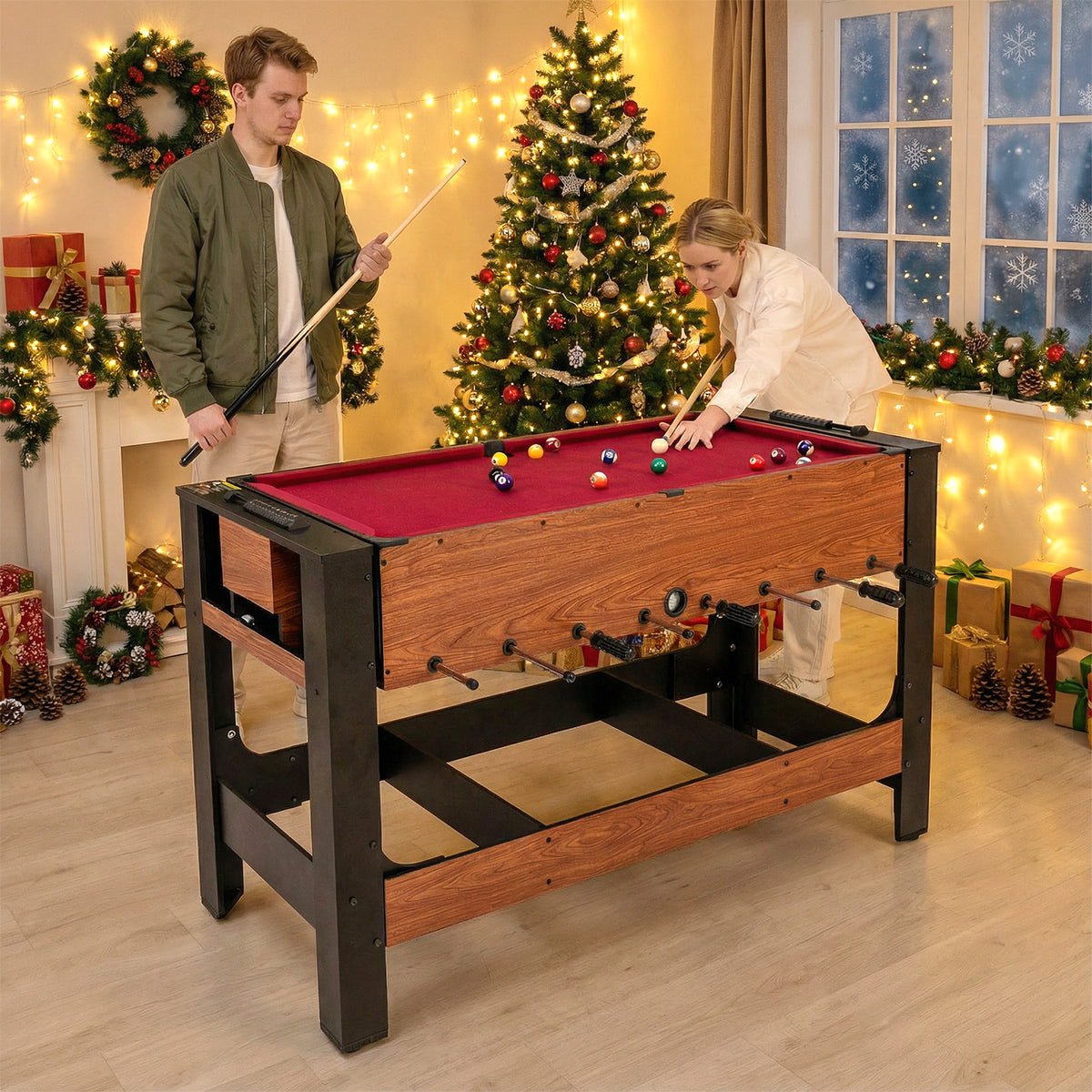 The game table set up for pool in a living room with a Christmas tree in the background