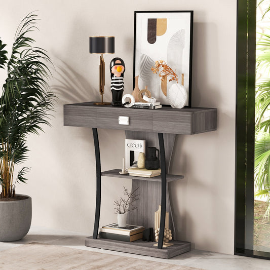 The console table styled with a lamp and decorative items in a bright living room setting