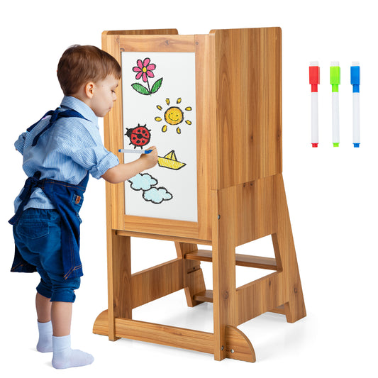 Toddler Kitchen Stool Helper with Chalkboard and Whiteboard being used by a boy drawing on the board