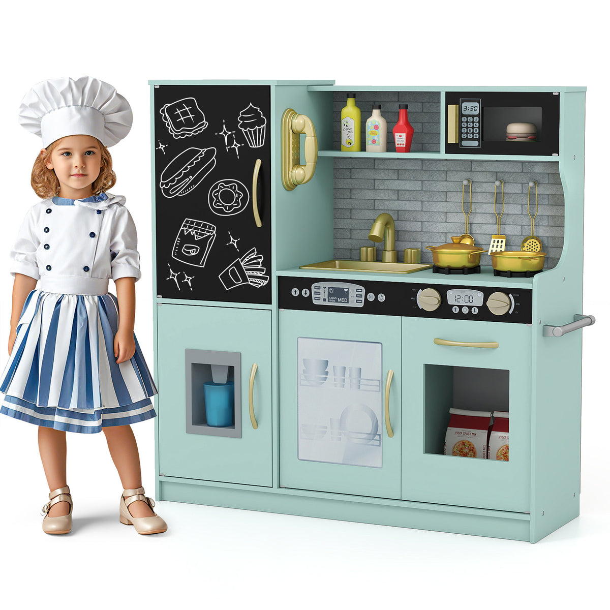 Young girl in chef outfit standing by the green pretend kitchen set with accessories
