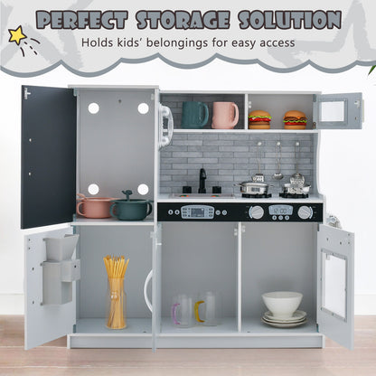 The play kitchen set with all doors and cupboards open to show the internal storage compartments