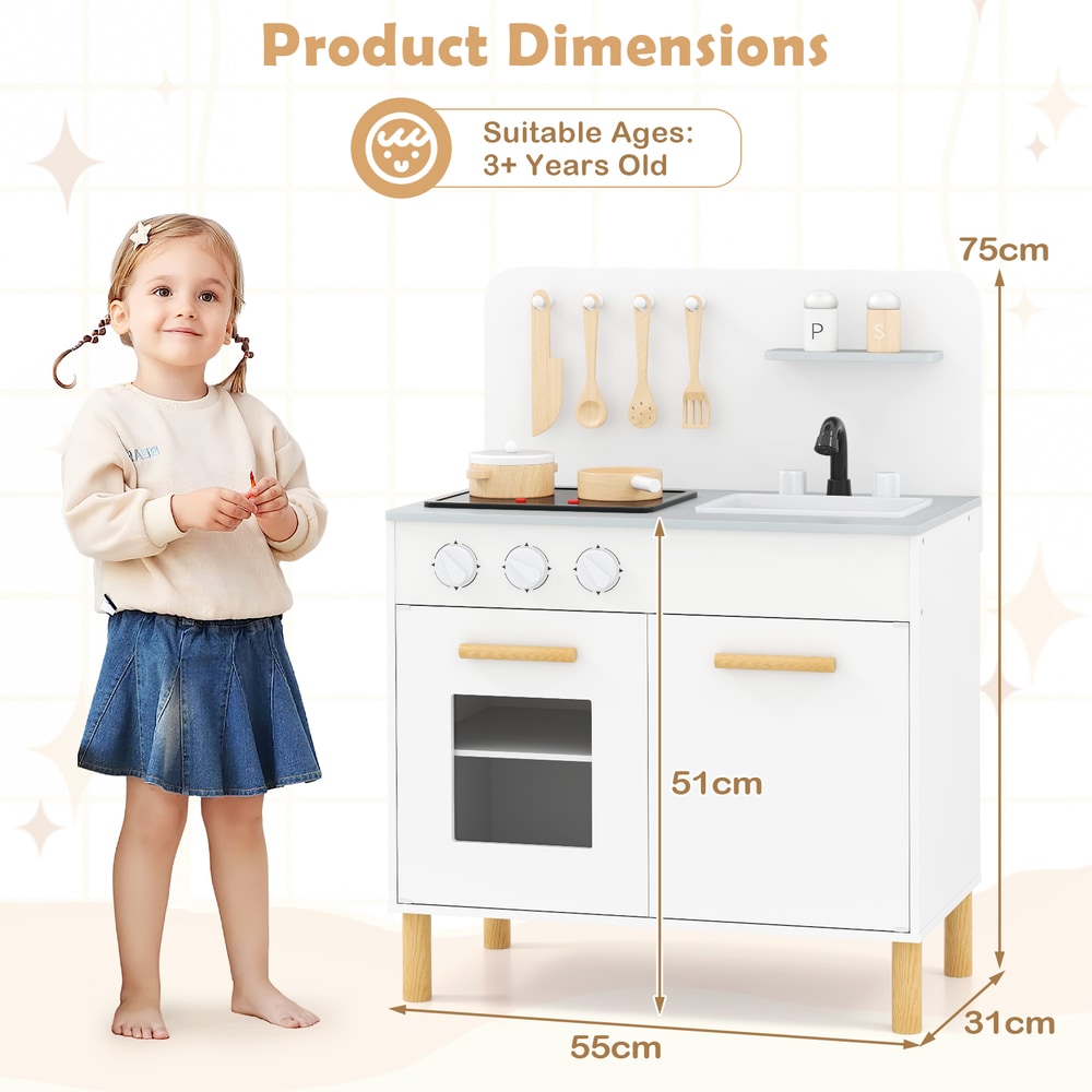Size diagram showing a toddler next to the white play kitchen set