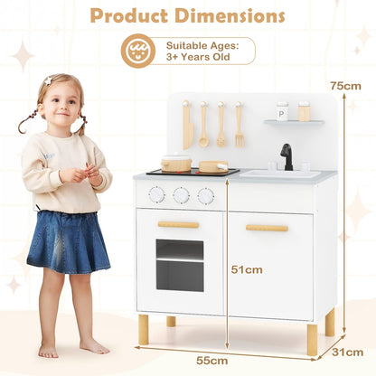 Size diagram showing a toddler next to the white play kitchen set