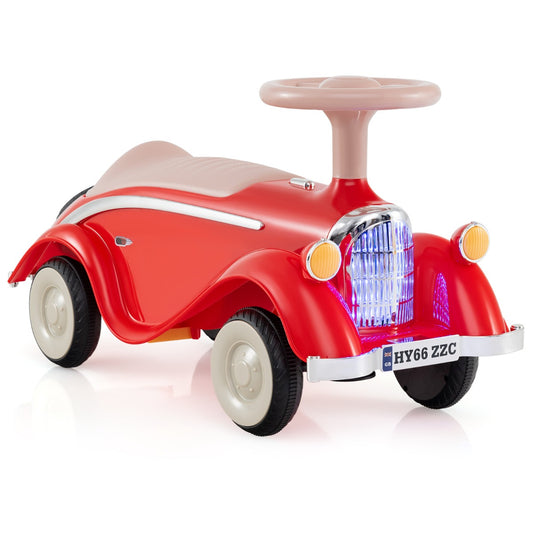 Toddler Ride on Toy in red with a beige seat and steering wheel on a white background