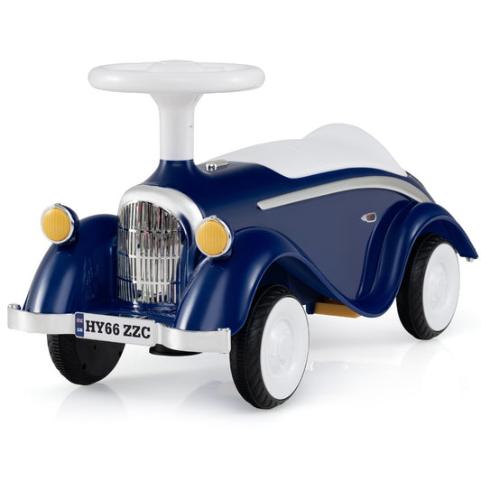 Toddler ride on toy in dark blue with a white seat and steering wheel, classic car design