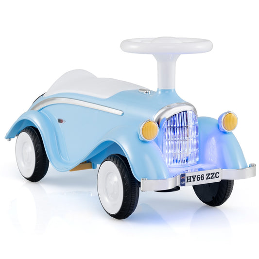 Toddler Ride on Toy in light blue with a white steering wheel and chrome front grille