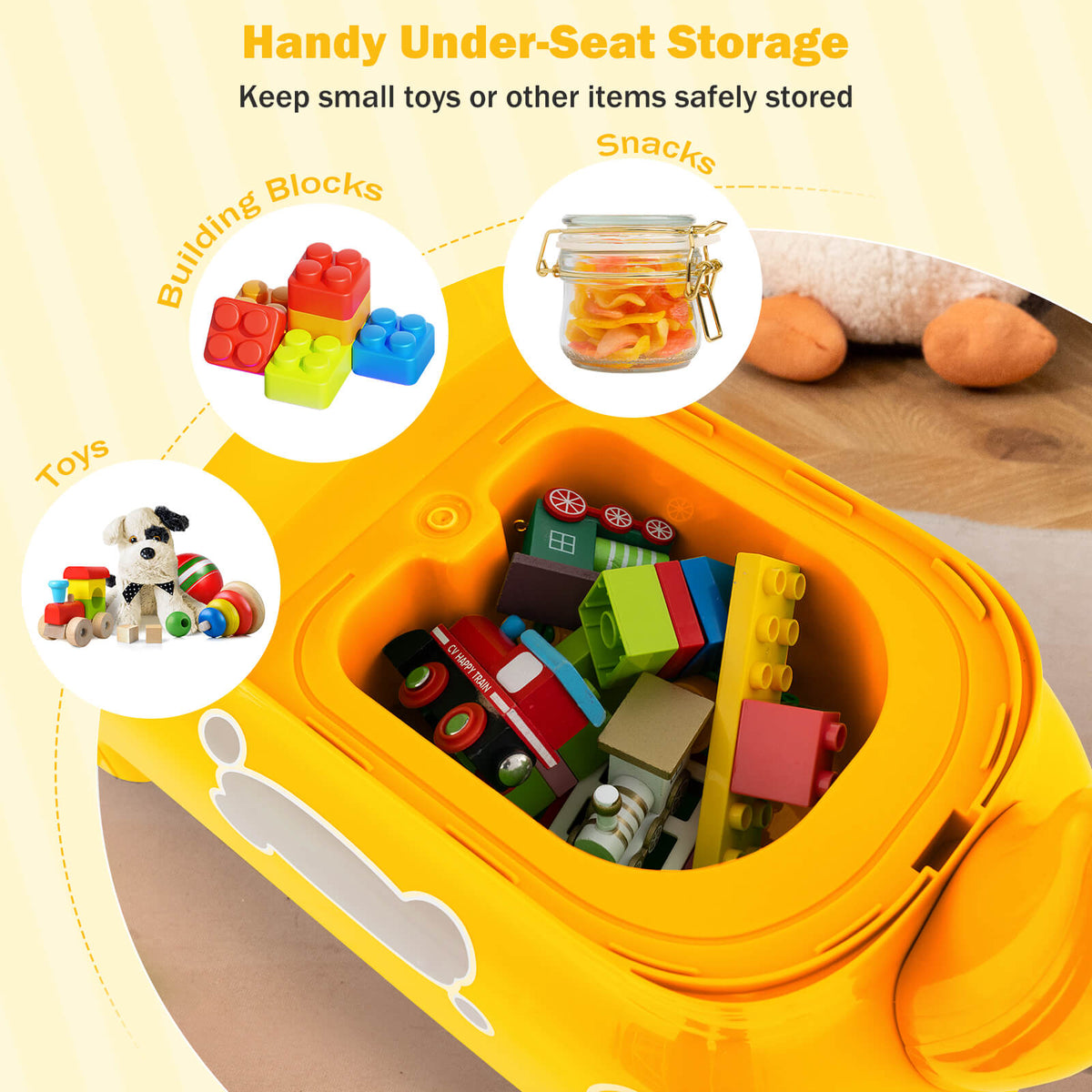 Open storage compartment of the yellow ride on toy filled with toys
