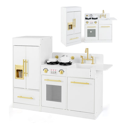 White toy kitchen playset with gold accents, showing the refrigerator, stove, and sink