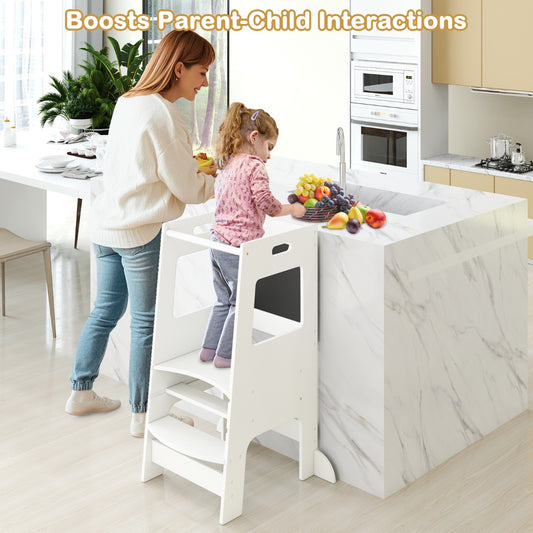 The kitchen stool in use by a young child helping an adult prepare food in a modern kitchen