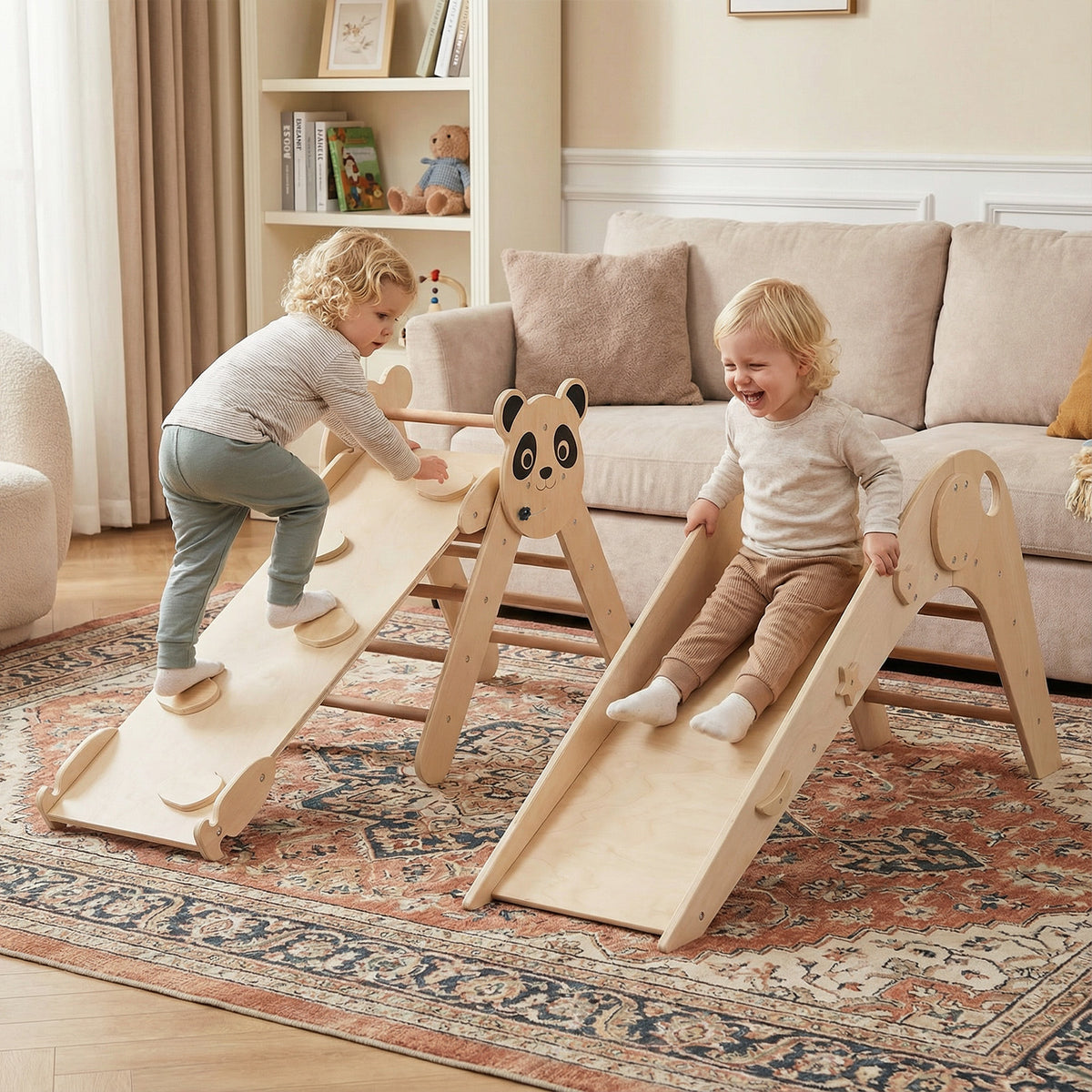 The climbing frame with two children playing on the slide and climbing ramp