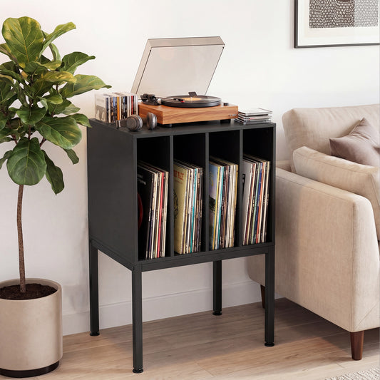 Black vinyl storage unit with a turntable and phone on top, placed in a living room