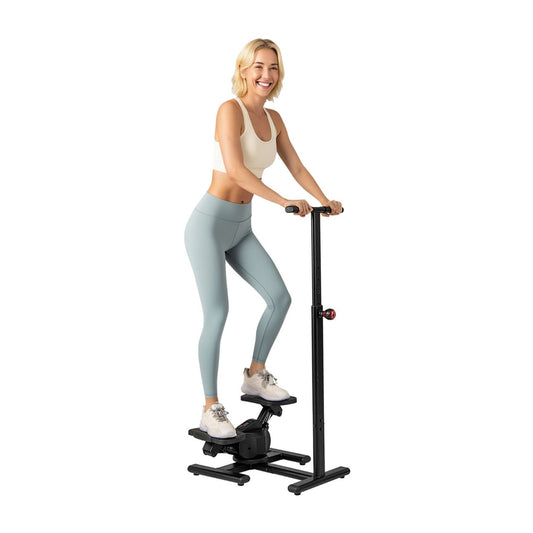 Twist Stepper with Adjustable Handlebar and LCD Monitor in black, shown from the front with a woman exercising on it