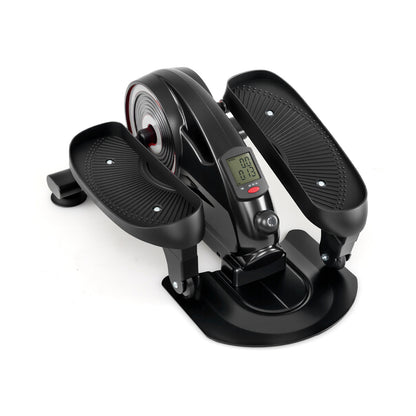 The under desk elliptical pedal exerciser in silver, viewed from a high angle showing the pedals and central unit