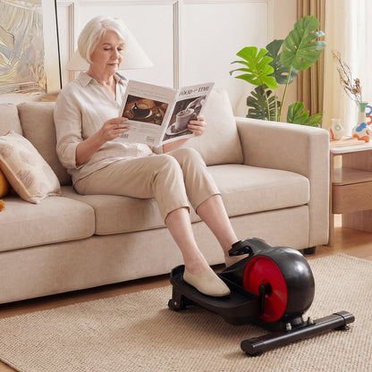 The pedal exerciser placed on a rug in a living room setting