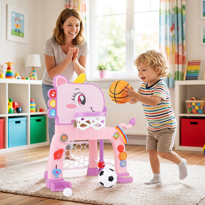 A pink unicorn toddler sports activity centre with a basketball hoop and soccer goal being played with indoors