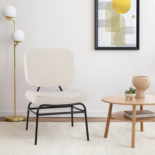 White upholstered accent chair in a modern living room next to a coffee table