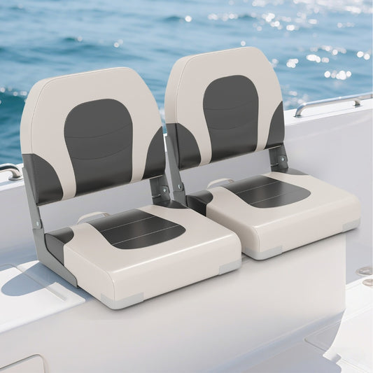 Two upholstered folding captain boat chairs installed on a boat deck