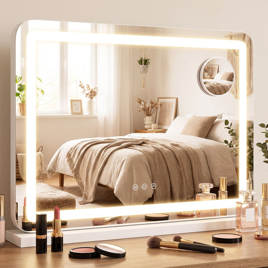 The vanity mirror with lights on, shown on a dresser with makeup and perfume bottles