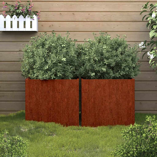 vidaXL Planters 2 pcs Corten Steel placed on a lawn in front of a wooden garden fence