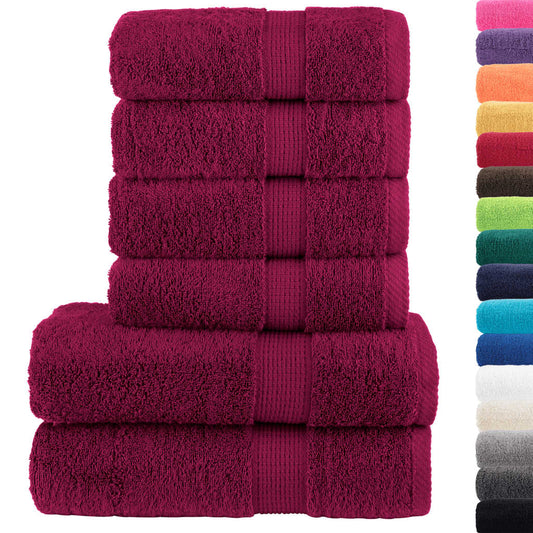 A stack of six towels in bordeaux and other colours