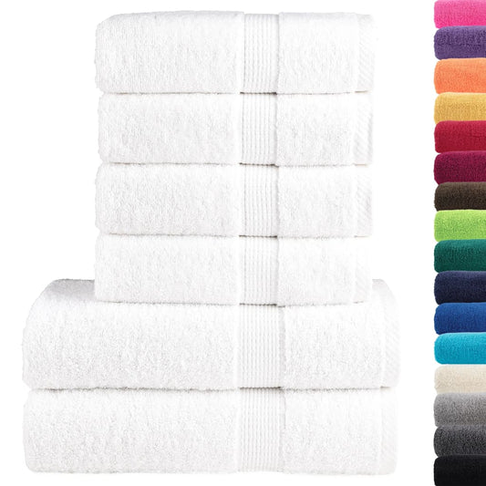 Six white towels stacked with a selection of coloured towels on the right