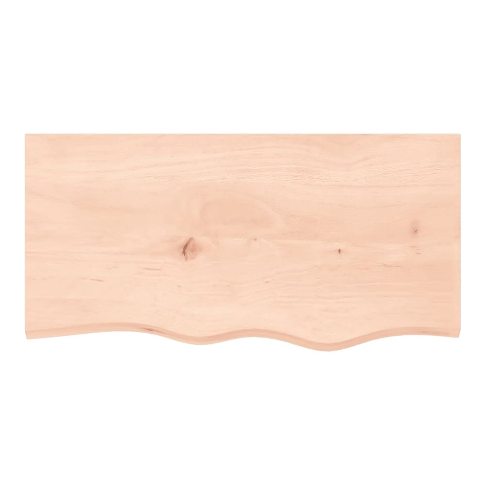 The wall shelf seen from directly above showing the wood grain and live edge detail