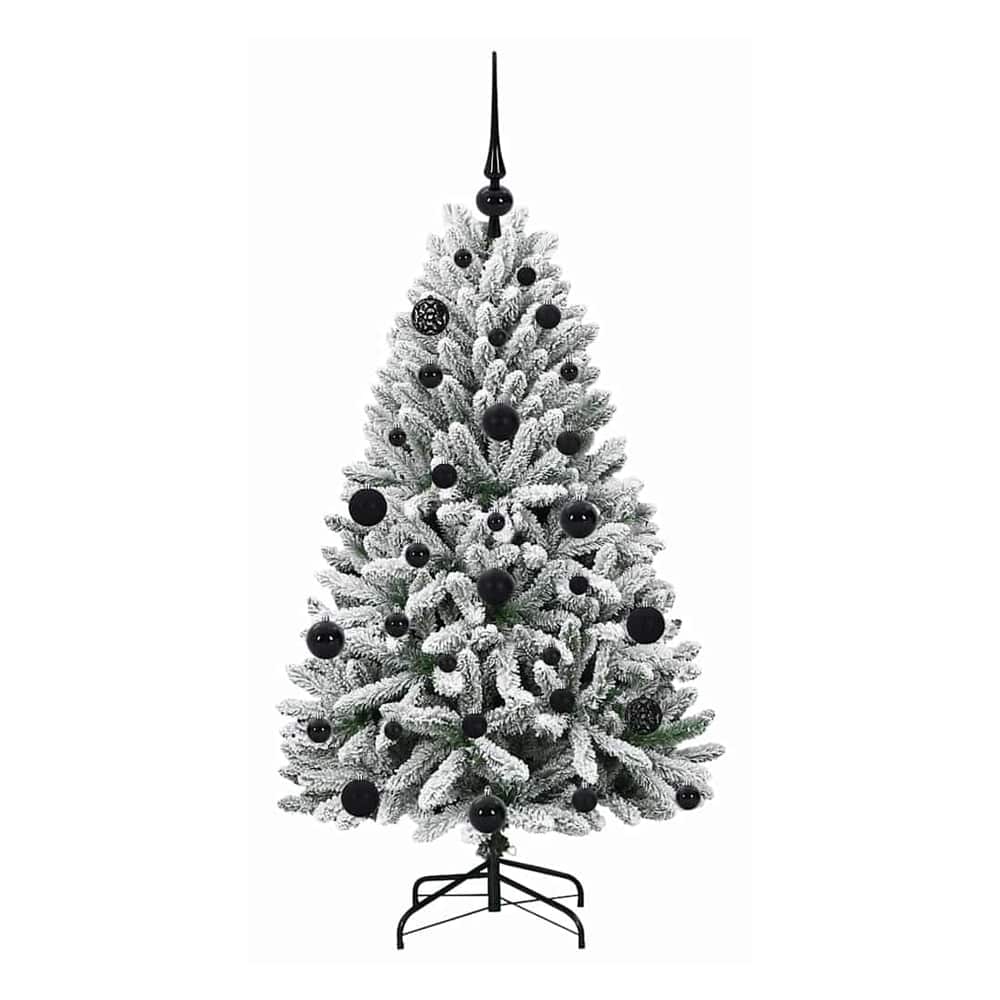 The artificial Christmas tree from the front, showing its shape and decorations