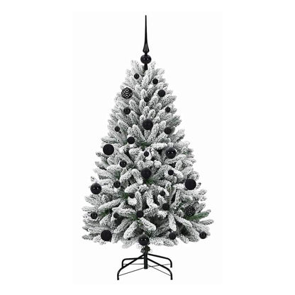 The artificial Christmas tree from the front, showing its shape and decorations