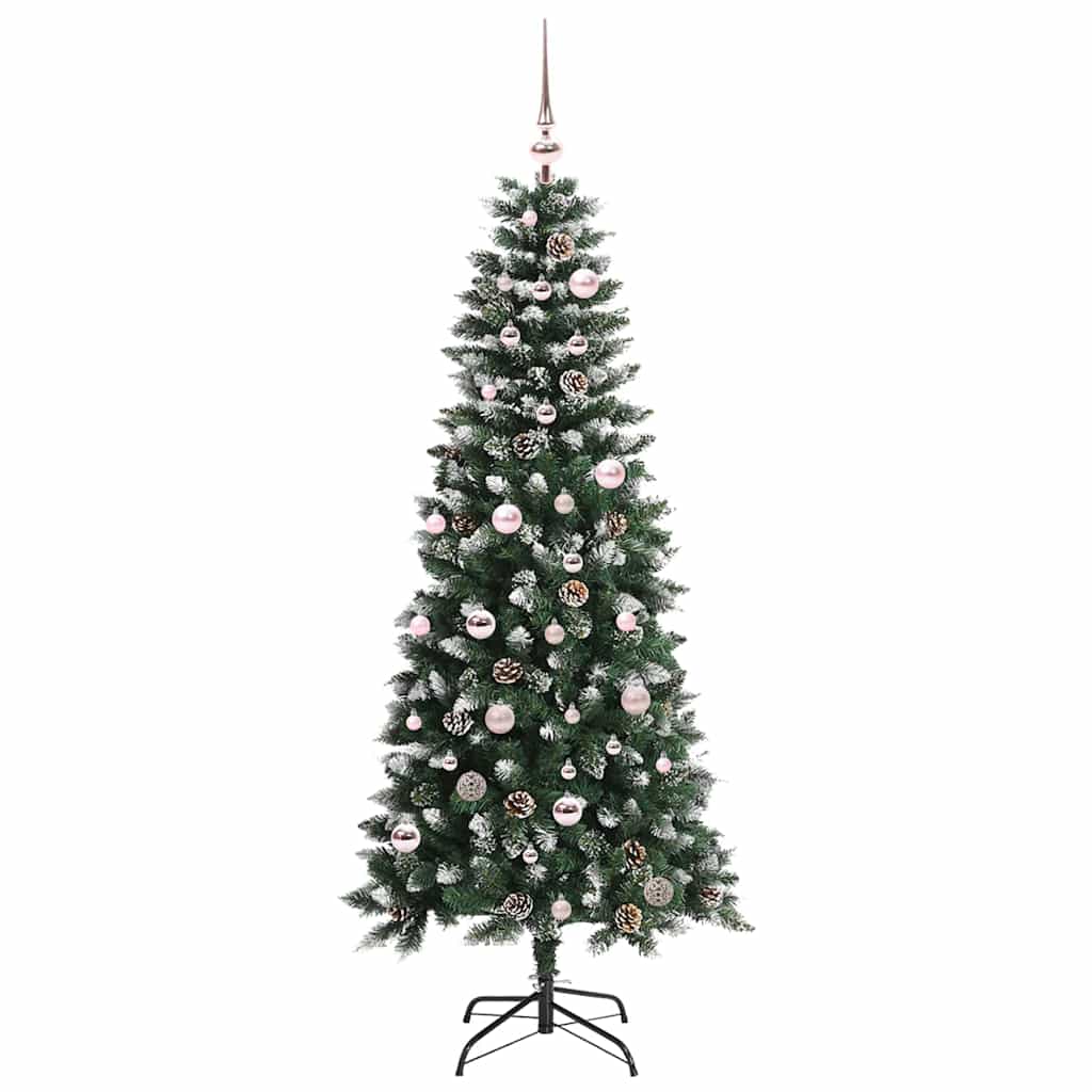 A tall green artificial Christmas tree stands on a black metal base