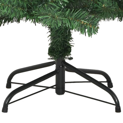 The black metal stand of a green artificial Christmas tree