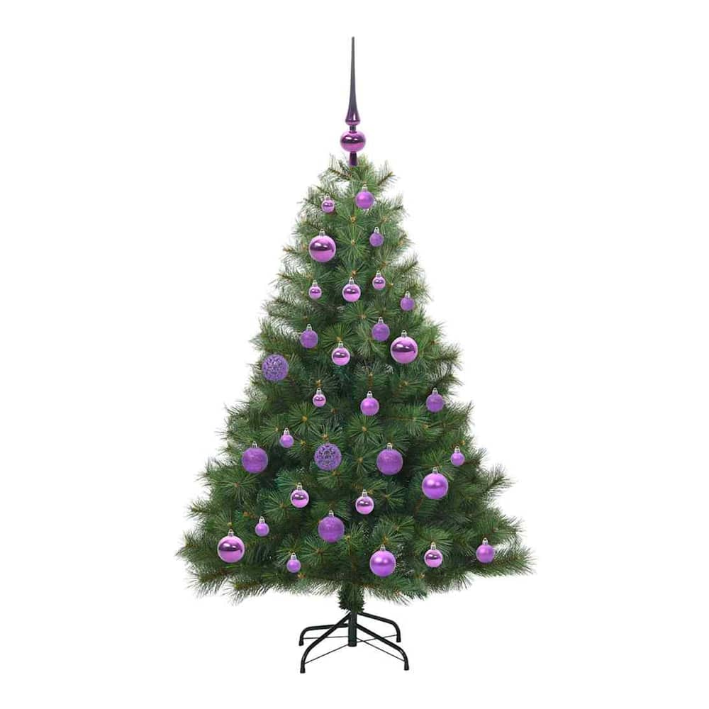 The artificial Christmas tree standing on a black metal stand, topped with a purple finial