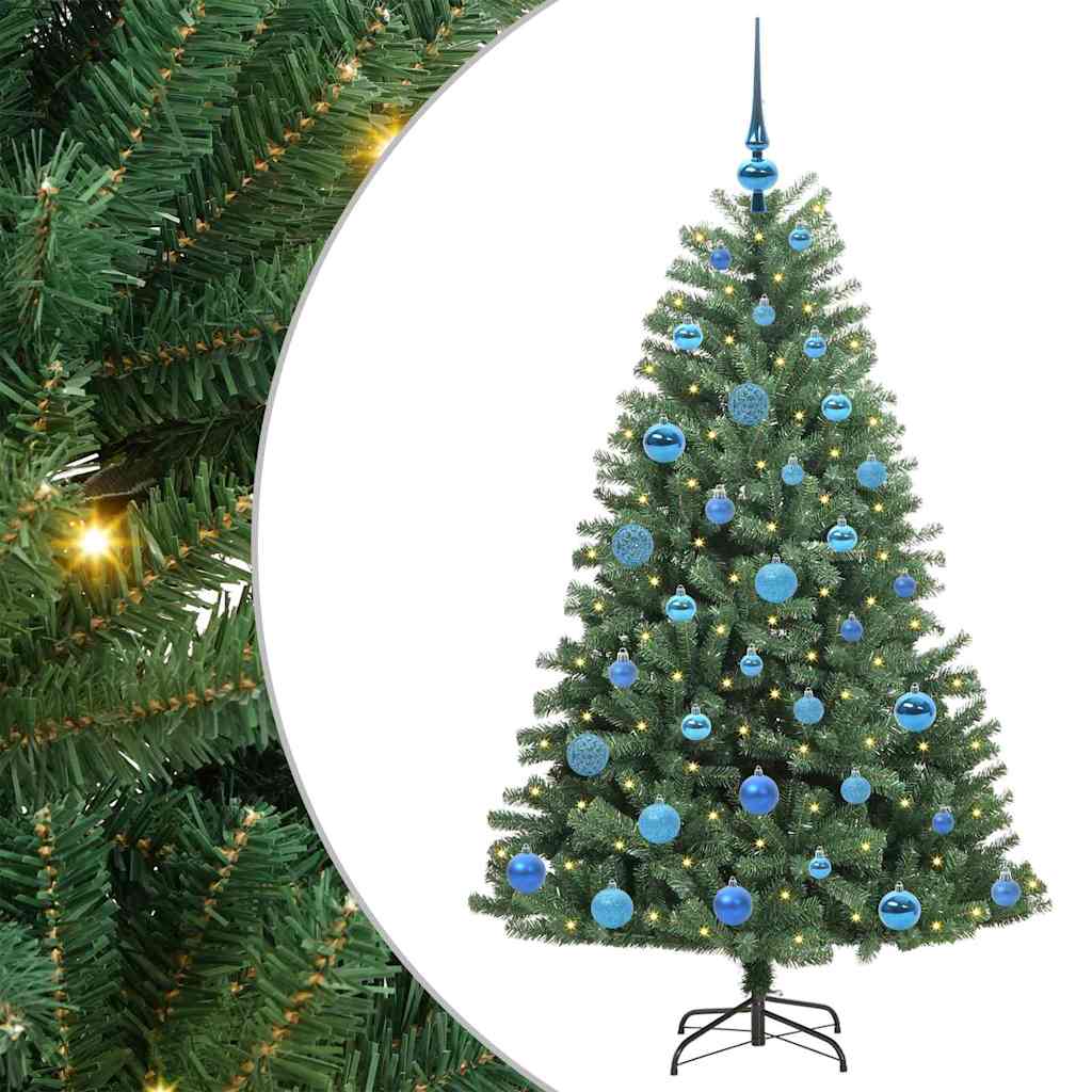 Close up of the green artificial hinged Christmas tree branches with lights