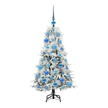 The white artificial Christmas tree fully decorated with blue baubles and lights
