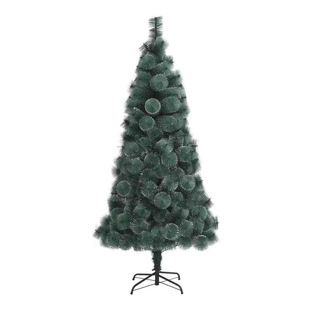The Christmas tree standing on a metal stand without any decorations or lights