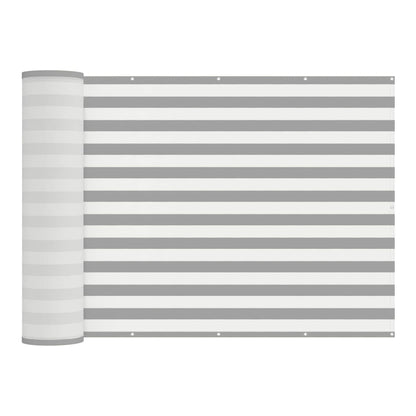 The balcony privacy screen rolled up showing its striped pattern