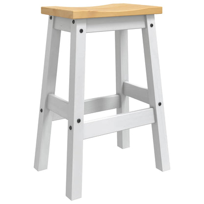 A close-up of the construction of a white and honey wax bar stool