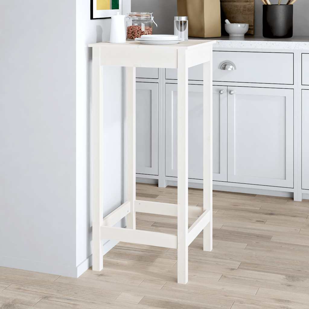 the bar table placed in a kitchen with kitchenware on the tabletop