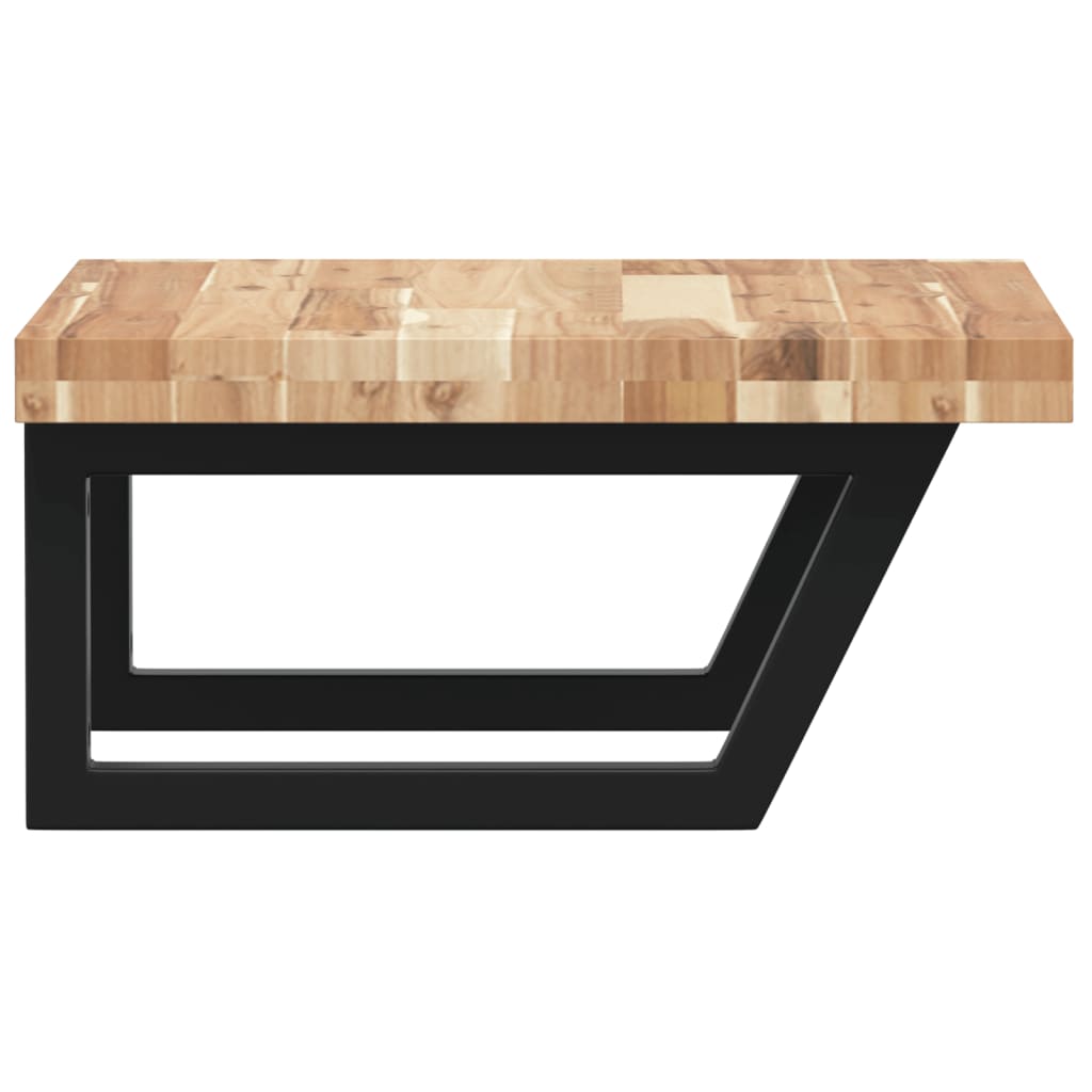 Close up of the solid wood top and black metal brackets of a bathroom vanity unit