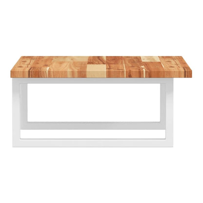 The wall mounted shelf unit from the front with a towel hanging